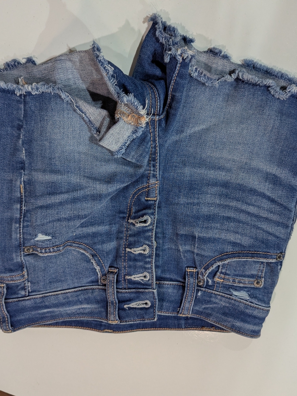 Women's Blue Distressed Button-Fly Jeans